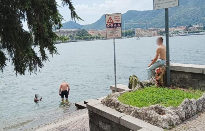 Como, más desafío que descuido: nadar en el lago justo debajo de la señal de prohibición